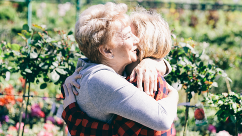 2 ladies hugging/caring 2